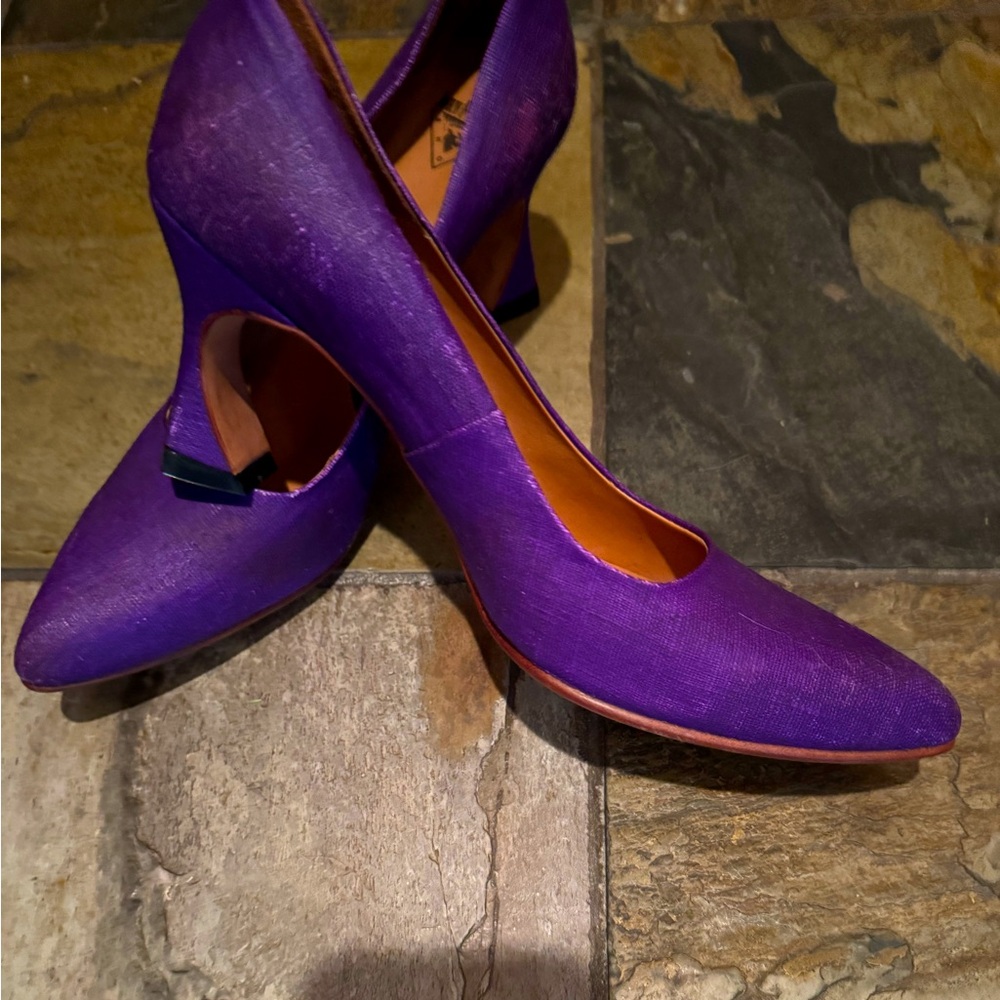 John Fluevog heels.  Super unique and cute.  Size 9